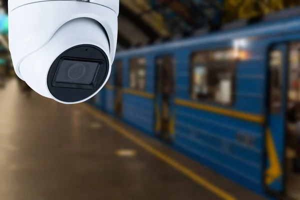 CCTV surveillance camera at railway station.Security system camera for protecting people from crime.Privacy monitor equipment in for police monitoring people in subway station.