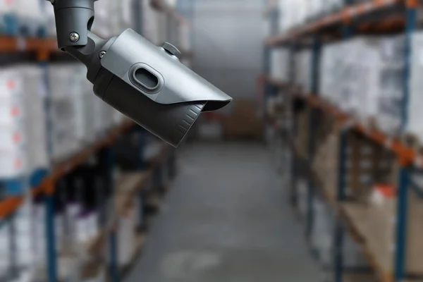CCTV system security in warehouse of factory chemical blur background