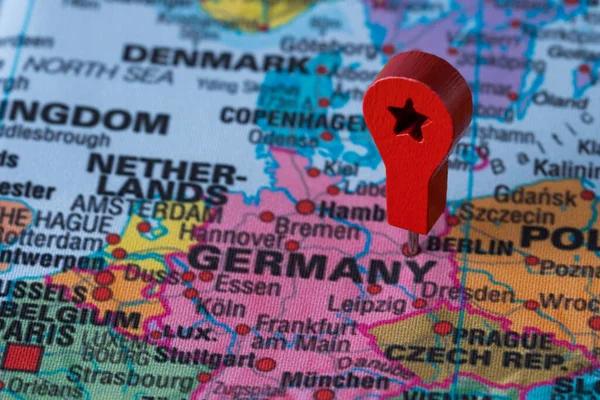 Red pin, point on the map of Germany. Concept travel background