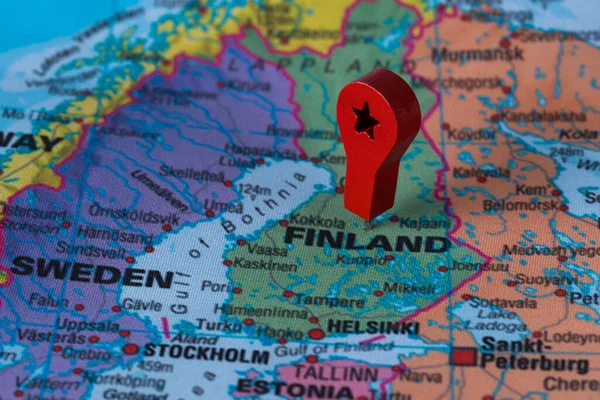 Red pin, point on the map of Finland. Concept travel background