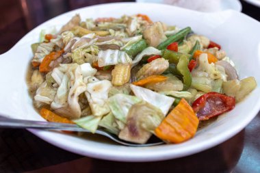 Chop suey is a dish in American Chinese cuisine and other forms of overseas Chinese cuisine