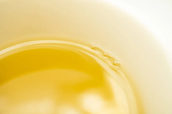 Green tea on a white background. Image of Japanese green tea. Cup of tea isolated on white background