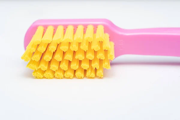 Toothbrush Pink Handle Yellow Brush Head Toothbrush Closeup White Background — Stock Photo, Image