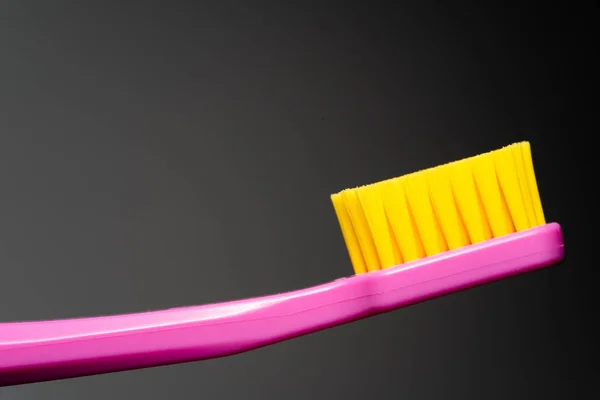 Toothbrush Pink Handle Yellow Brush Head Toothbrush Closeup White Background — Stock Photo, Image