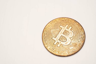 Bitcoin close up rusty black dirty isolated on white background cryptocurrency bad scam. Fall of the cryptocurrency