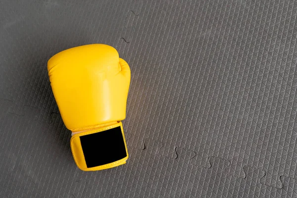 yellow boxing gloves in Gym Fitness.