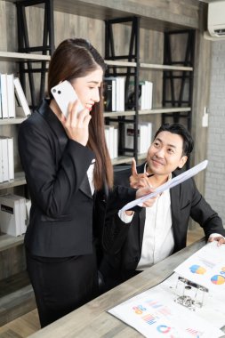 Business woman using smartphone. business success concept.