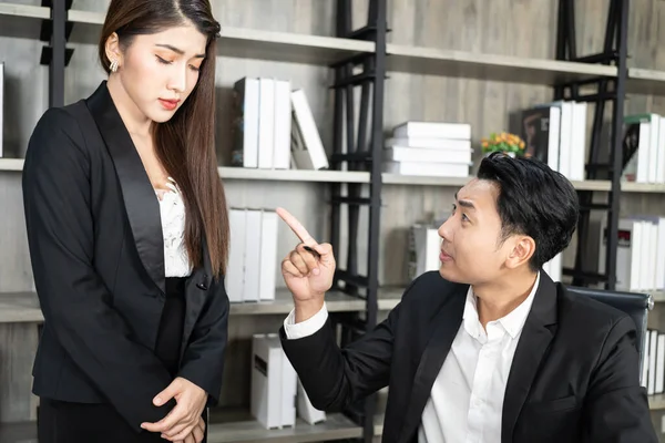 A male boss who pursues responsibility and a female businessman who receives power harassment. dissatisfied boss points on rude mistakes on report criticizing work scolding accusing  female employee