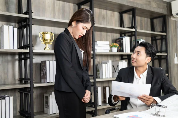 A male boss who pursues responsibility and a female businessman who receives power harassment. dissatisfied boss points on rude mistakes on report criticizing work scolding accusing  female employee