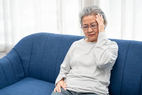 Senior Woman Sitting Sofa Home Headache Feeling Pain Expression Being — Stock Photo, Image