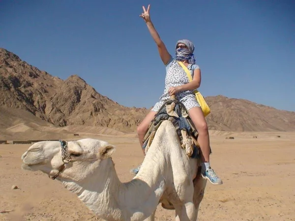 Girl Riding Camel — Zdjęcie stockowe