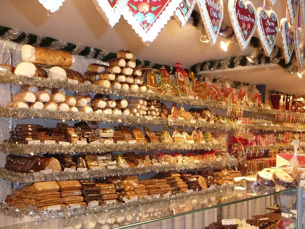 Cute shop with sweets, caramel candies, gingerbread and cream cakes