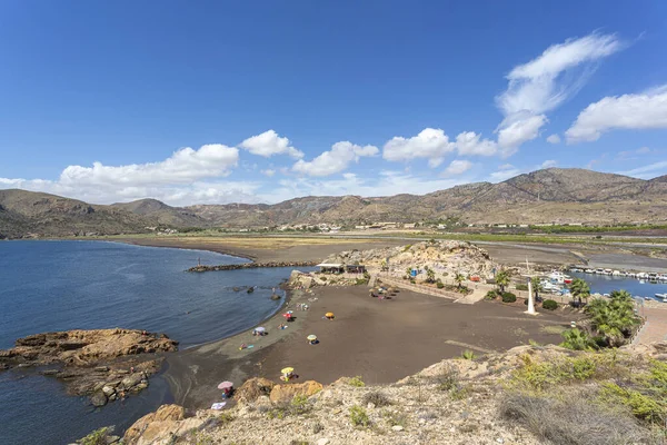 İspanya 'nın Murcia Özerk Topluluğu Portman kasabasındaki siyah kum plajı.