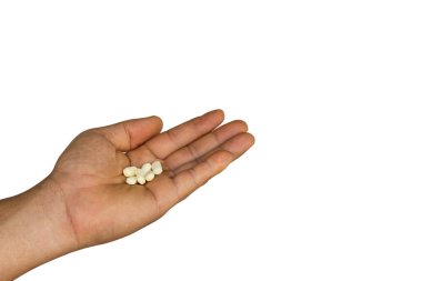 İnsan eliyle alınan haplar, beyaz arka plan, sağlık hizmetleri, beyaz arka plan izolasyonu