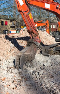 Bu fotoğraf 2014 'te Almanya' da çekilen bir inşaat sahasında yıkım kazıcısını gösteriyor.