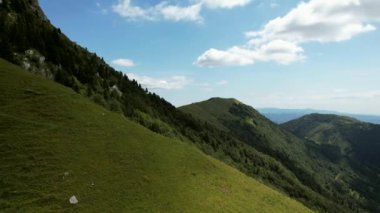 Filmed in the Krn mountains in Slovenia. The Krn mountains are part of the Julian Alps in the north-western part of the country, in the municipality of Kobarid. This is typical Slovenian nature.