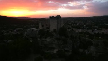The city of Vaison-la-Romaine in France has a rich Roman history. It has two cathedrals, and lies in proximity to the mountain range Dentelles de Montmirail. The river Ouvze flows through the city.