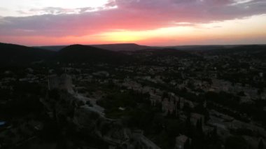 The city of Vaison-la-Romaine in France has a rich Roman history. It has two cathedrals, and lies in proximity to the mountain range Dentelles de Montmirail. The river Ouvze flows through the city.