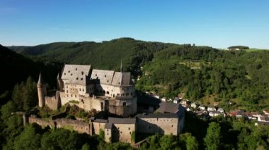 Vianden Castle is located in the city of Vianden in the north of Luxembourg. It is a huge fortified castle with origins dating from the 10th century. It is built in a Romanesque style.