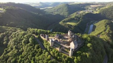 Bourscheid Castle is located near the village of Bourscheid in the north of Luxembourg. It is a medieval castle dating back to Roman times, and it has a circular wall with multiple watch towers.