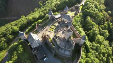 Bourscheid Castle is located near the village of Bourscheid in the north of Luxembourg. It is a medieval castle dating back to Roman times, and it has a circular wall with multiple watch towers.