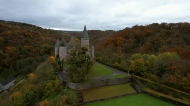 This is the Castle of Vves just outside the village of Celles, in the province of Namur, Belgium. It occupies a rocky platform in Wallonia, and is classified as a major heritage site.