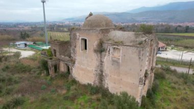 This is the abandoned church of Monticello in Italy. The name derives from the fact that it stands on a hill. The exterior of the church is in big contrast with the beautiful interior.