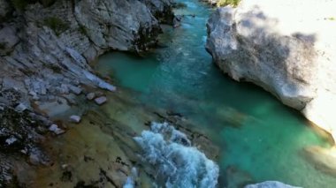 The Soa River in Slovenia, part of the Triglav National Park, has an emerald green color, and is one of the most beautiful rivers in all of Europe. It is also a popular kayaking destination.