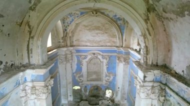 This is the abandoned church of Monticello in Italy. The name derives from the fact that it stands on a hill. The exterior of the church is in big contrast with the beautiful interior.