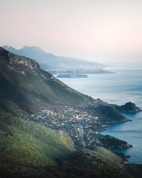 This is a photo of the beautiful coast near the Italian city of Maratea. The photo was taken from the viewpoint near the statue Christ the Redeemer, the third largest Jesus statue in Europe. The statue is as high as 22 meters.