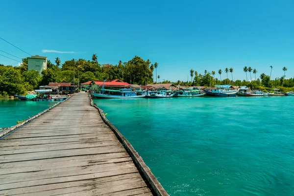 The beach at Biduk-Biduk, East Kalimantan, Indonesia With calm waves, clear blue water, rows of coconut trees and white sand that spoils the eyes of visiting tourists