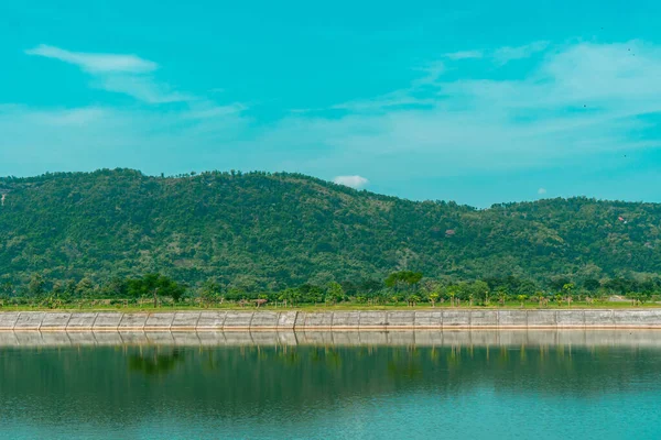 The reservoir as a natural water storage place when the dry season comes, as well as a tourist location