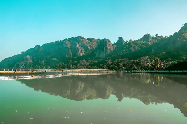 The reservoir as a natural water storage place when the dry season comes, as well as a tourist location