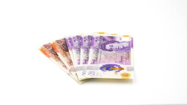 100 GBP değerinde 20 ve 10 GBP banknotları, Sterling Sterlini