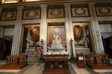Golden decorations of walls and domes in churches in the capital of Italy, the eternal city of Rome 