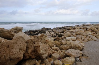 Large stones on the shore of the Mediterranean Sea 