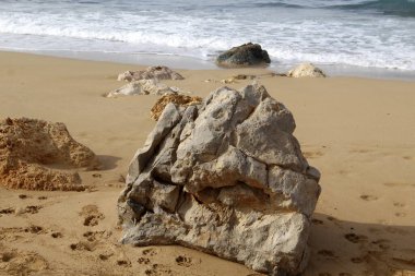 Large stones on the shore of the Mediterranean Sea 