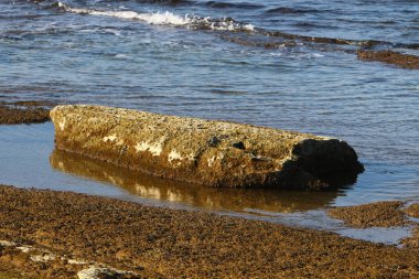 Large stones on the shore of the Mediterranean Sea 