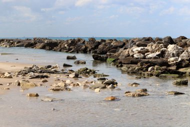 Large stones on the shore of the Mediterranean Sea 