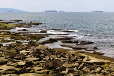 Large stones on the shore of the Mediterranean Sea 