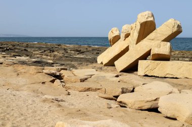 Large stones on the shore of the Mediterranean Sea 