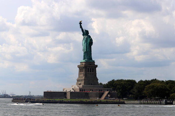 New York, USA. September 4, 2022 . Statue of Liberty against the cloudy sky.