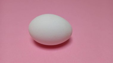 Uncooked egg in white color with white background food meal lunch dinner breakfast healthy eating 