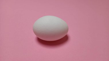 Uncooked egg in white color with white background food meal lunch dinner breakfast healthy eating 