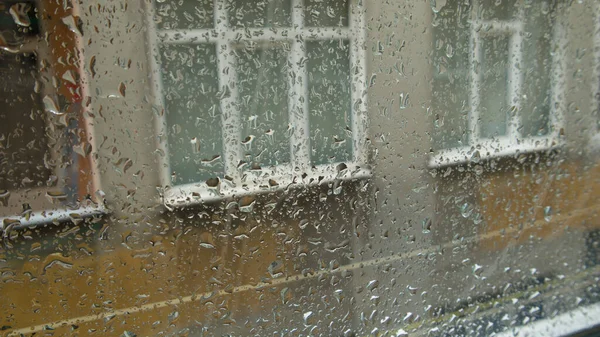 glass splash of raindrops and raindrops on glass