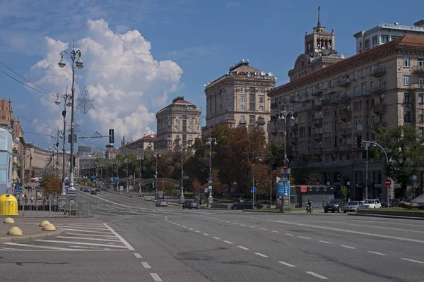 Taras Shevchenko University and a monument hidden from a missile strike and Khreshchatyk Street today.