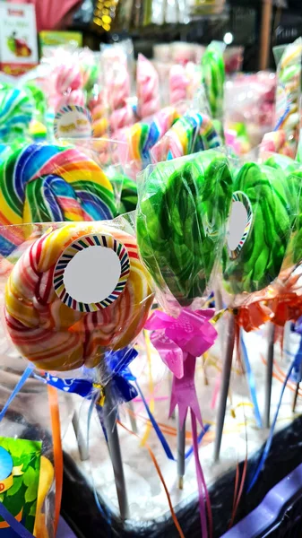 Colorful Rainbow Lollipops Spinning Wooden Sticks Available Night Festival — Stockfoto