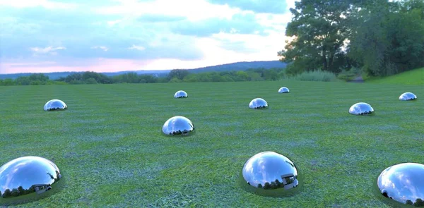 Shiny metal balls stick out of the ground on a field covered with green grass, reflecting the cloudy evening sky. 3d render.