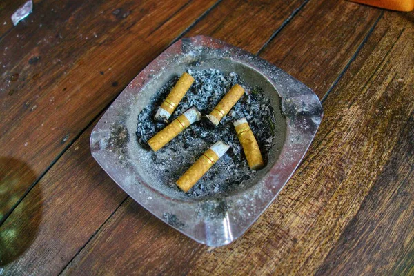 Ashtray Full Cigarette Butts Wooden Table Remember Smoking Kills You — 图库照片