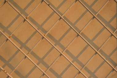 Beautiful shadow gate in the afternoon. Artistic shadow pattern.